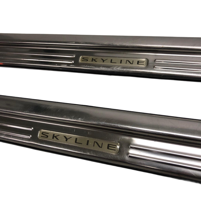 The Skyline Shed - Rare Optional Chrome Door Panel / Scuff Plate trims to suit R33 - USED PARTS SKUA1